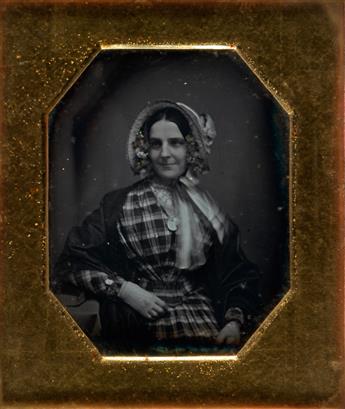(EARLY DAGUERREOTYPY) Group of 13 early daguerreotypes, including a lovely half-plate of a fashionably